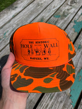 Load image into Gallery viewer, Vintage Hole in the Wall Bar Camo Trucker Hat
