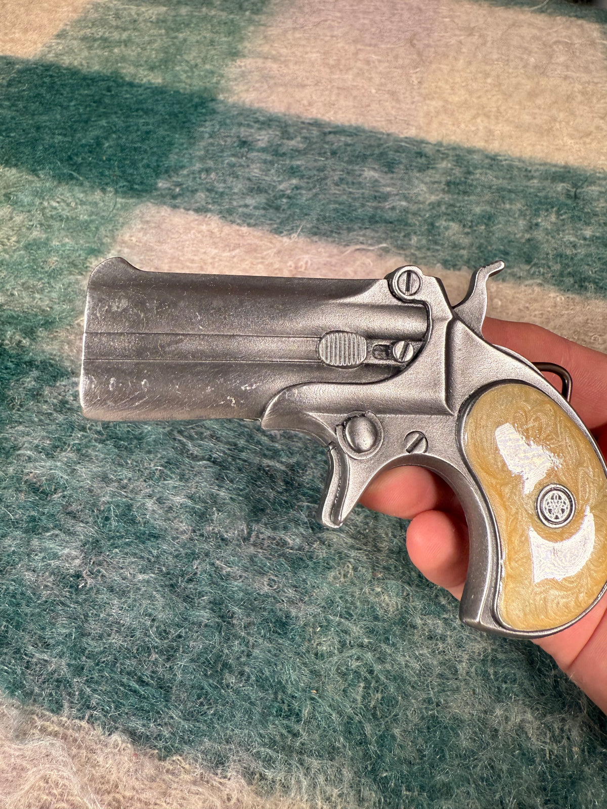 Vintage Tan Pistol Belt Buckle